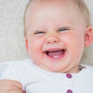 Close up image of a baby laughing - Reliable creative marketing strategies for your business that actually work - Image