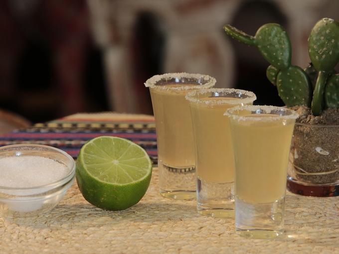 There are cacti, lime, salt and drinks on the table - 80 Creative and inspiring engagement party ideas - Image